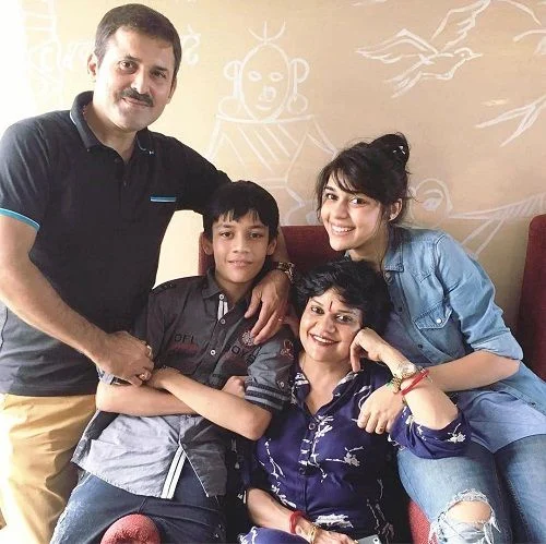 Eisha Singh with her family